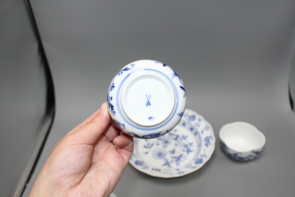 A Meissen blue and white quatrelobed bowl and cover, width 11.5cm, a circular bowl and cover, 8.5cm and a blue and white soup plate, 23